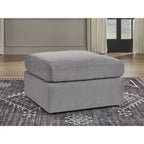 Grand pouf ottoman gris foncé avec tissu de performance anti-taches