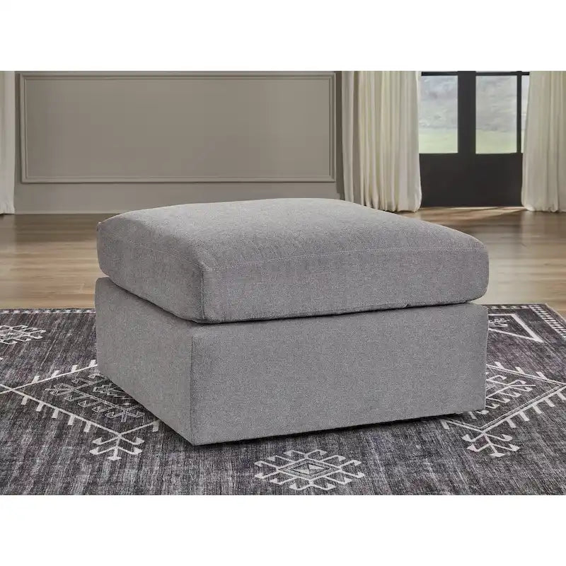 Grand pouf ottoman gris foncé avec tissu de performance anti-taches